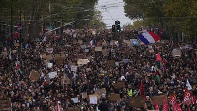 File photo: Protesters march during a demonstration in Paris France pledges education reforms after protests over costs, school funding