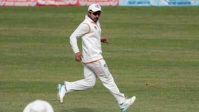 Jammu and Kashmir's Shubham Khajuria fields during the Ranji Trophy Group A cricket match between Madhya Pradesh and Jammu and Kashmir, in Srinagar. (PTI Photo) Rohit Sharma takes five-wicket haul on Ranji Trophy comeback as MP bowled out for 196
