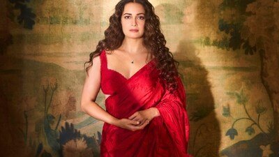 The actor wears a vibrant red saree from Roseroom by Isha Jajodia styled with a delicate pendant necklace from CLARA. The actor wears a vibrant red saree from Roseroom by Isha Jajodia styled with a delicate pendant necklace from CLARA.