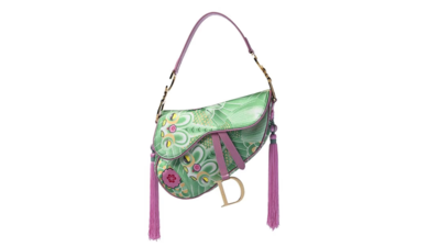 A woman paid about £80 for a Dior bag in a Cotswolds charity shop without knowing if it was genuine; experts identified it as a rare 2003 Koi Saddle Bag, and it later sold for £7,870/Image: Kinghams Auctioneers A woman paid about £80 for a Dior bag in a Cotswolds charity shop without knowing if it was genuine; experts identified it as a rare 2003 Koi Saddle Bag, and it later sold for £7,870