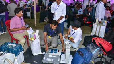 File photo: Polling officials check Electronic Voting Machines (EVMs) and other polling materials at a distribution centre (Picture credit: ANI) Bypoll election results 2026: Date, time and where to watch vote counting