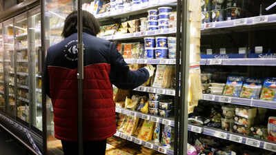 A worker restocking products in a refrigerated section of a supermarket two days after the cyberattack on several French supermarkets in Montreuil, France (AP photo) 700 supermarkets hit, millions lost: France warns cyberattacks on refrigeration systems may still be ongoing