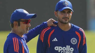 India's coach Gautam Gambhir, left, chats with captain Shubman Gill during a practice session. (AP Photo) ‘This is not cricket’: Gautam Gambhir questions Guwahati pitch after India chase 406 with ease