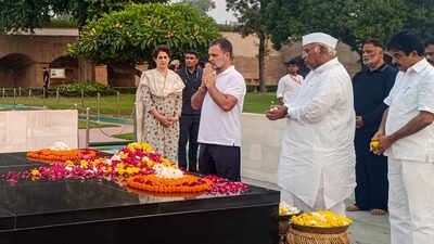 Congress president Mallikarjun Kharge and party leaders Rahul Gandhi, Priyanka Gandhi Vadra and KC Venugopal pay tribute to Mahatma Gandhi during a visit by INDIA bloc leaders at Raj Ghat. (PTI photo) 'Dhappa' gets a Day 3 twist as police allow Rahul, INDIA bloc MPs to protest at Raj Ghat