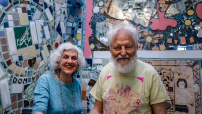 Isaiah Zagar and wife Julia Zagar/Image: Instagram @The Philadelphia Inquirer Philadelphia artist Isaiah Zagar turned bottles, bike wheels and ceramic shards into a 3,000-square-foot maze; after a 2004 threat to dismantle it, the community saved it and tickets now frequently sell out