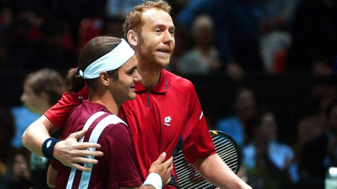 Marc Rosset with Roger Federer
