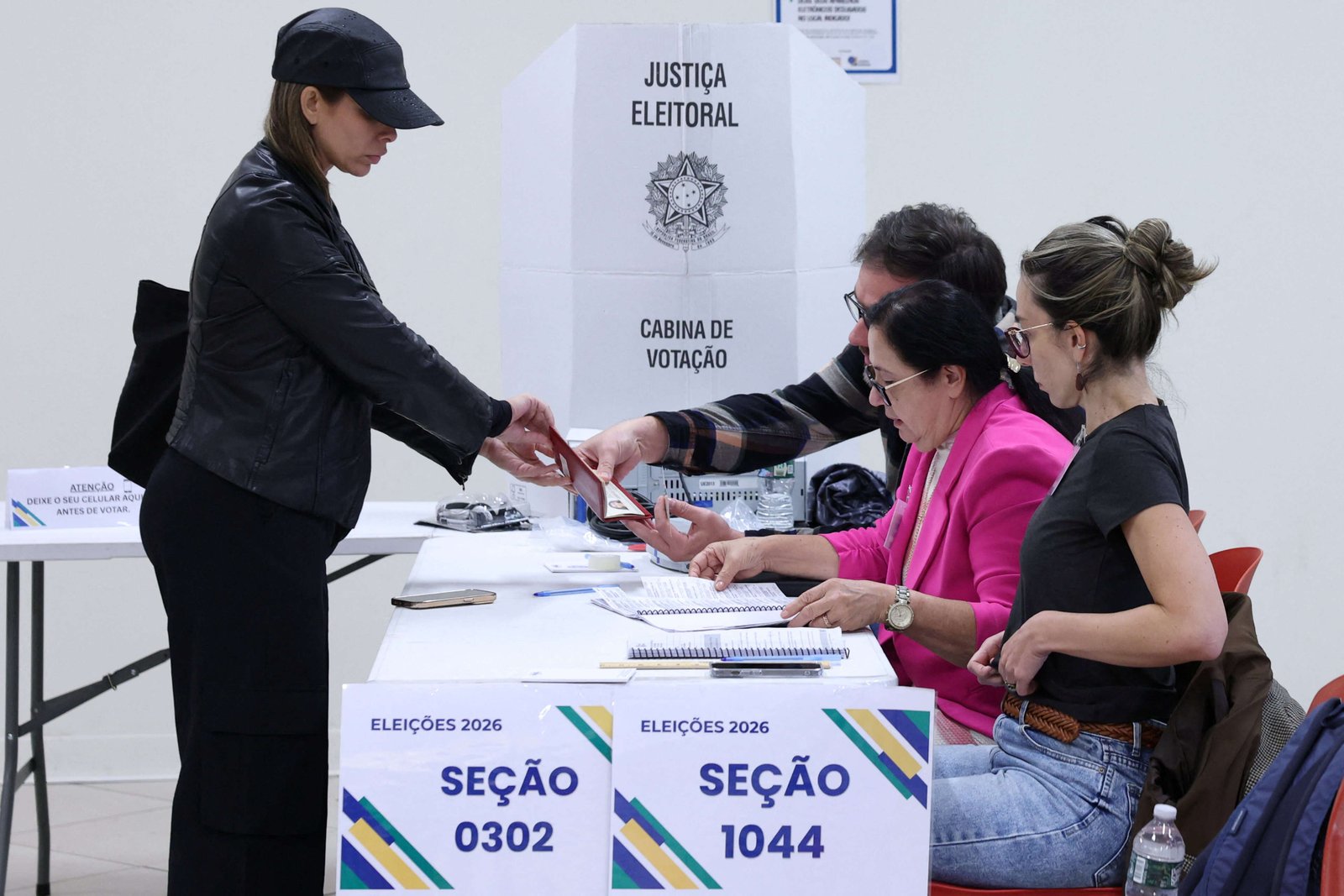 People vote in Brazil's general election at a polling station in New York