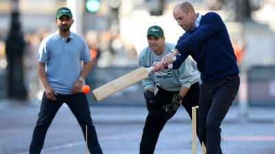 Britain's Prince William joins cricket stars for an informal game on The Mall, in London, Britain, October 13, 2026. Ajinkya Rahane in slips watches Prince William in action Ajinkya Rahane, Ganguly play tennis-ball cricket with Britain's Prince WIlliam outside Buckingham Palace