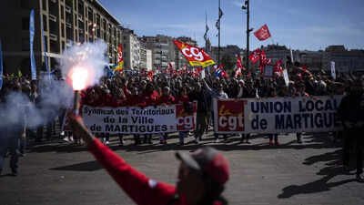 Protesters march during a demonstration in Marseille, southern France. France's government is unfurling massively ramped-up security measures for a fresh blast of marches and strikes against unpopular pension reforms. ‘Remain vigilant’: India urges citizens in France to avoid protest sites ahead of fresh demonstrations