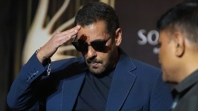 Salman Khan gestures in greeting as he leaves a press conference announcing the dates and venue for the 2027 International Indian Film Academy (IIFA) Awards in Mumbai, India, Thursday, Oct. 22, 2026. (AP Photo/Rafiq Maqbool) (AP Photo/Rafiq Maqbool)