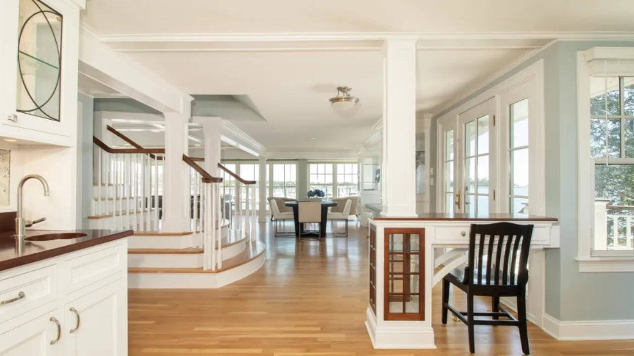 The main living area offers views of the Thimble Islands, while the house provides direct waterfront access.
