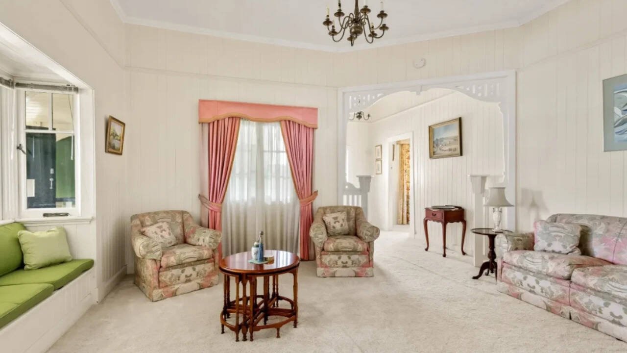 The Queenslander-style home has three bedrooms, two bathrooms and three parking spaces.