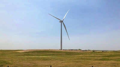 The turbine sends electricity to a nearby power station, from where it is supplied to local customers. On a 160-acre Nebraska farm parcel, one wind turbine and its equipment use about 1 acre; the developer says a typical 30-year lease averages $10,000 to $12,500 a year, versus about $600 for top-dollar corn on that acre