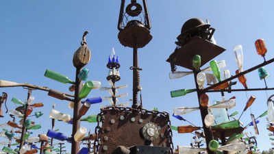 The two-acre property has around 200 bottle trees made using more than 1,000 glass bottles California cement worker Elmer Long turned discarded bottles and scrap metal into a desert art forest; as Route 66 turns 100, his two-acre ranch has 200 trees, 1,000+ bottles and visitors from around the world