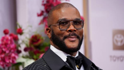 Tyler Perry/Image: AP In 1992, Tyler Perry put his $12,000 savings into a failed Atlanta play and later spent months living in a car; decades later his $750,000 gift helped pay back taxes for 300+ seniors and freeze taxes for 100 more