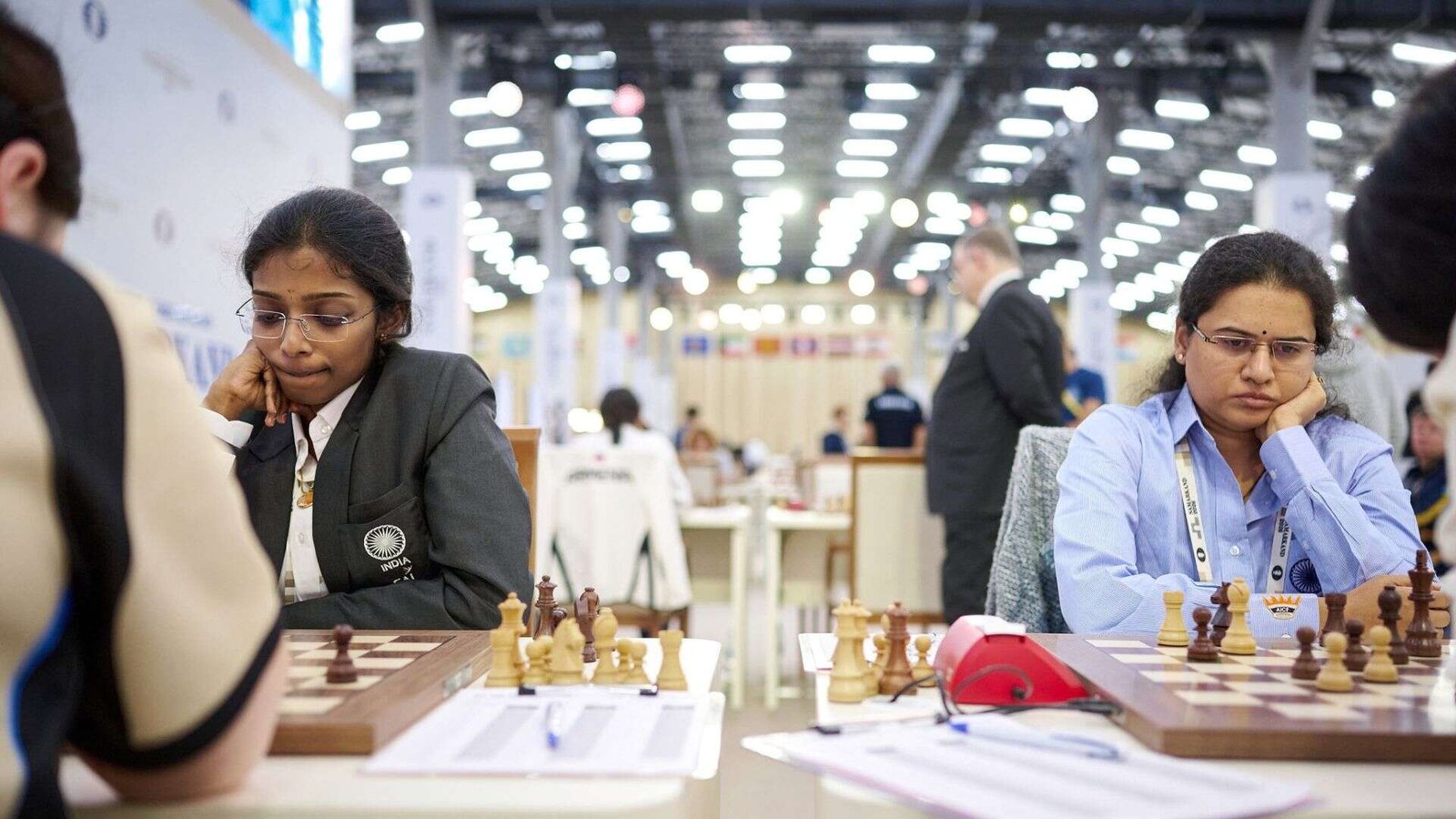 Vaishali (on left) and Koneru Humpy (on right) play the top two boards for India (Photo by Rafal Oleksiewicz for FIDE)