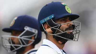 Virat Kohli and Ajinkya Rahane wait to go out to bat on Day 3 of the ICC WTC Final between India and New Zealand at The Hampshire Bowl on June 20, 2021 in Southampton, England. No Virat Kohli, Rohit Sharma in Rahane's all-time India Test XI; picks Dravid, Tendulkar and Dhoni