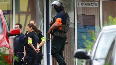 BMW crashes into group in Germany's Hanover, police launch hunt after suspects flee
